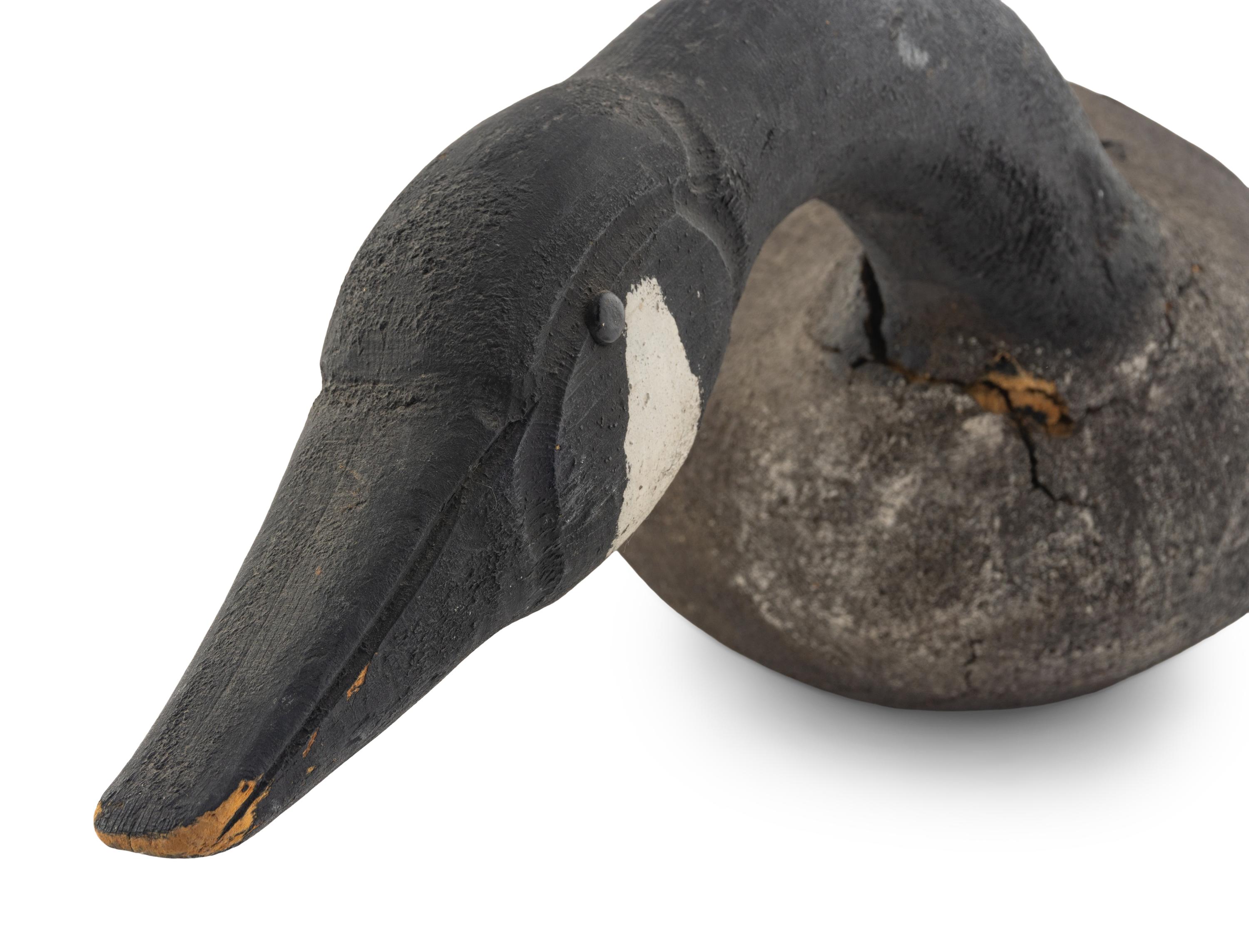 A Carved and Painted Wood Canada Goose Decoy