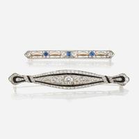 A collection of two diamond, gem-set, and platinum brooches circa 1930s