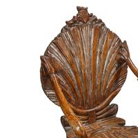 An Italian Carved Three-Piece "Grotto" Seating Suite