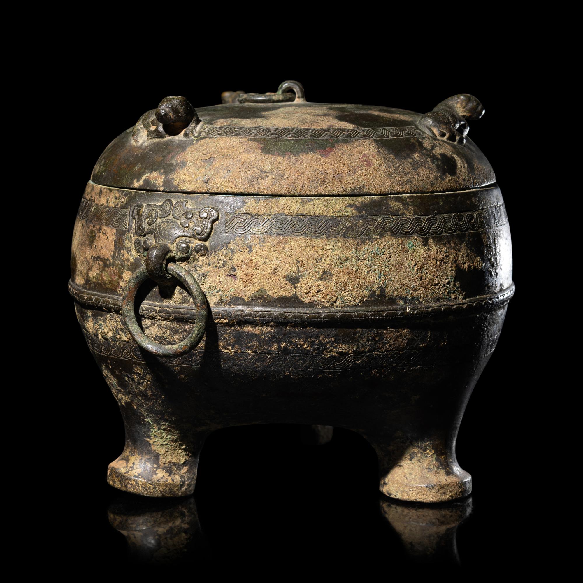 A Chinese Archaic Bronze Covered Tripod Vessel, Dun, Spring and Autumn Period 春秋 青銅敦