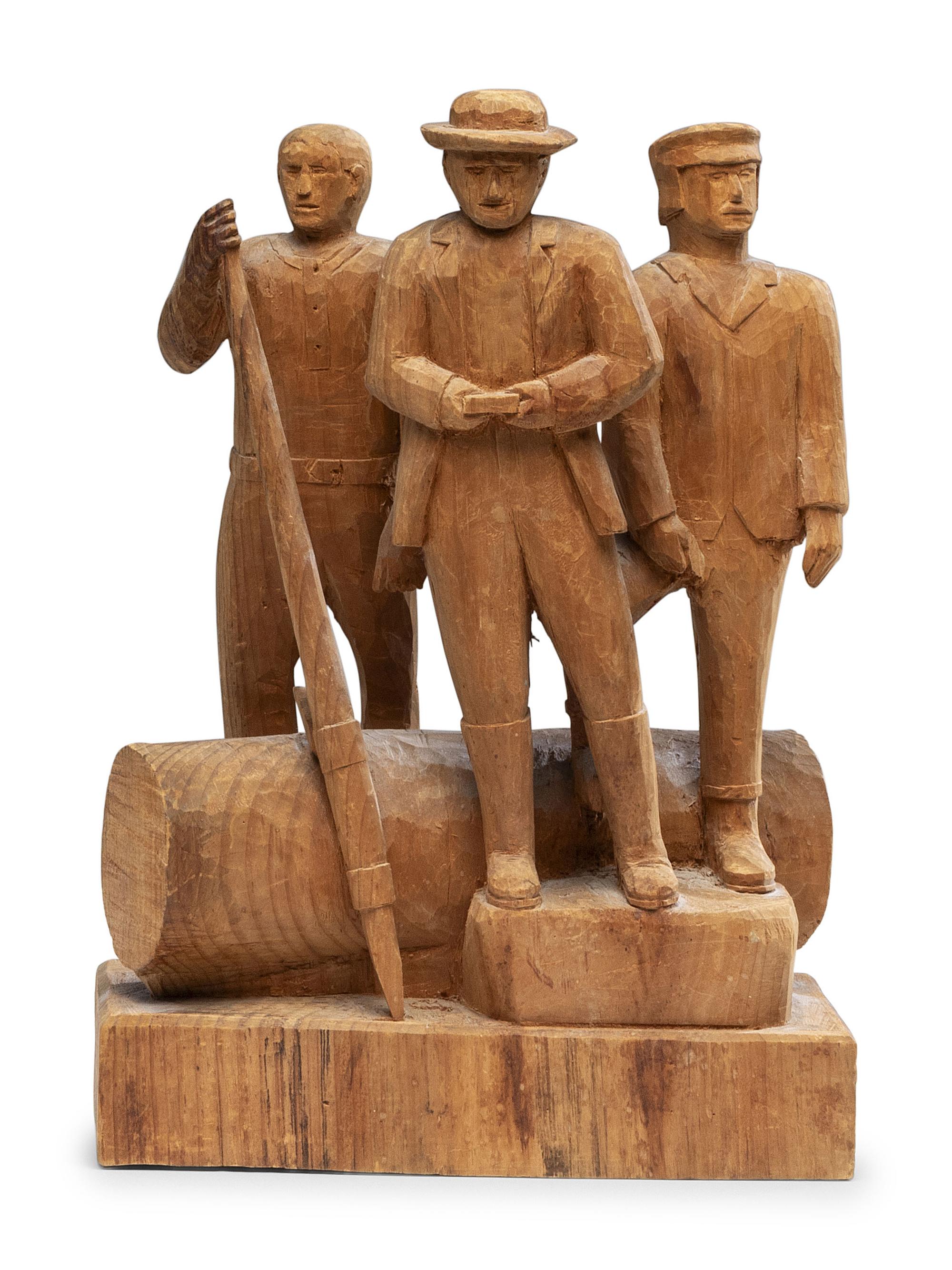 A Folk Art Carved Pine Group of Lumberjacks