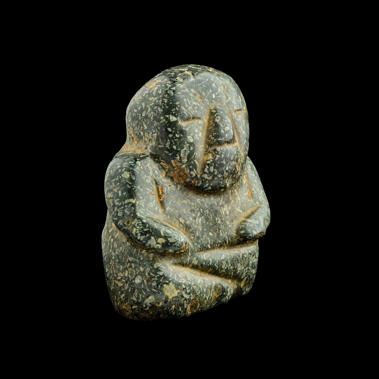 A Chontal or Olmec Jade Seated Figure