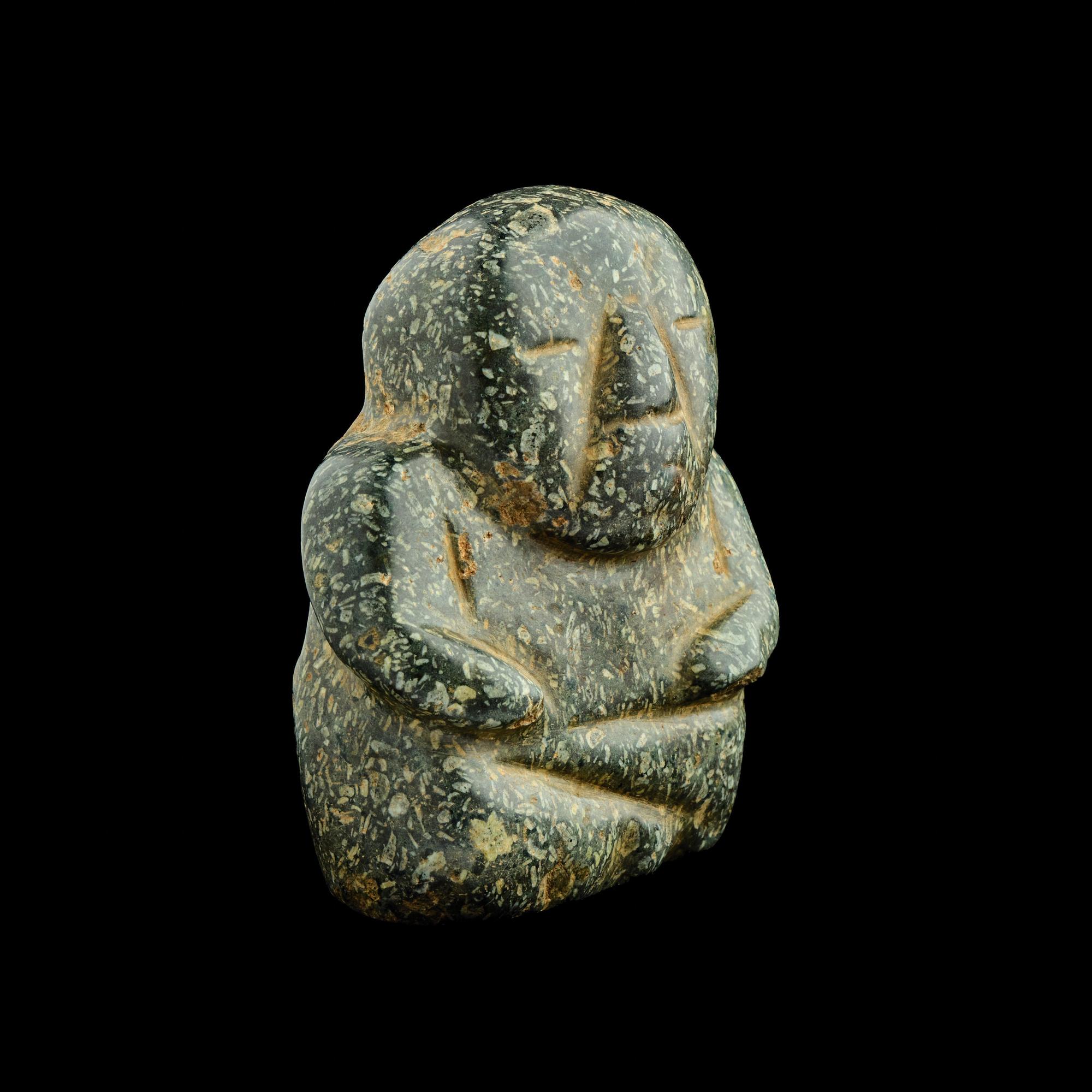 A Chontal or Olmec Jade Seated Figure