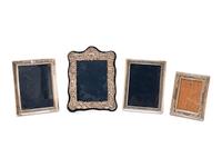 A Group of Four John Bull Ltd. Silver Picture Frames