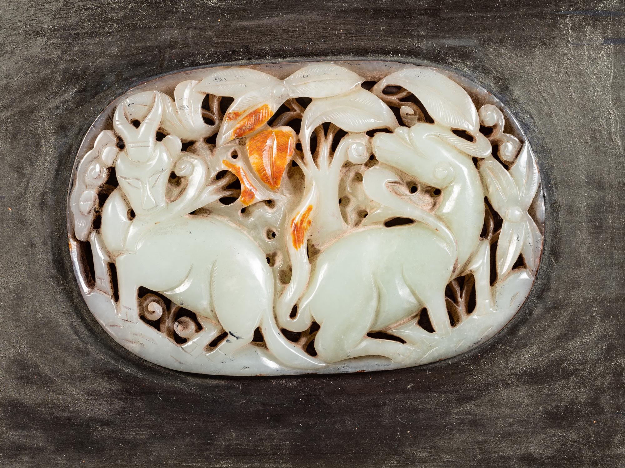 A Chinese Celadon Jade Inset Hardwood Panel