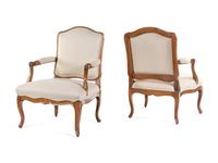 A Pair of Louis XV Carved Beechwood Fauteuils