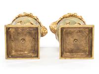 A Pair of French Gilt Bronze and Onyx Urn Ornaments