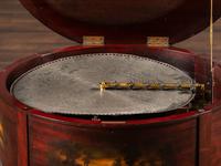 A Regina 'Rookwood ' Paint Decorated 20 Inch Drum Music Box