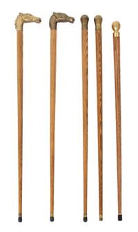 A Collection of Five Brass Handled Ash Canes Length of tallest 35 1/2 inches. — 20TH CENTURY