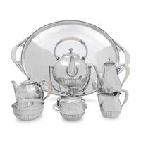 A Georg Jensen Cosmos Seven-Piece Silver Tea and Coffee Service