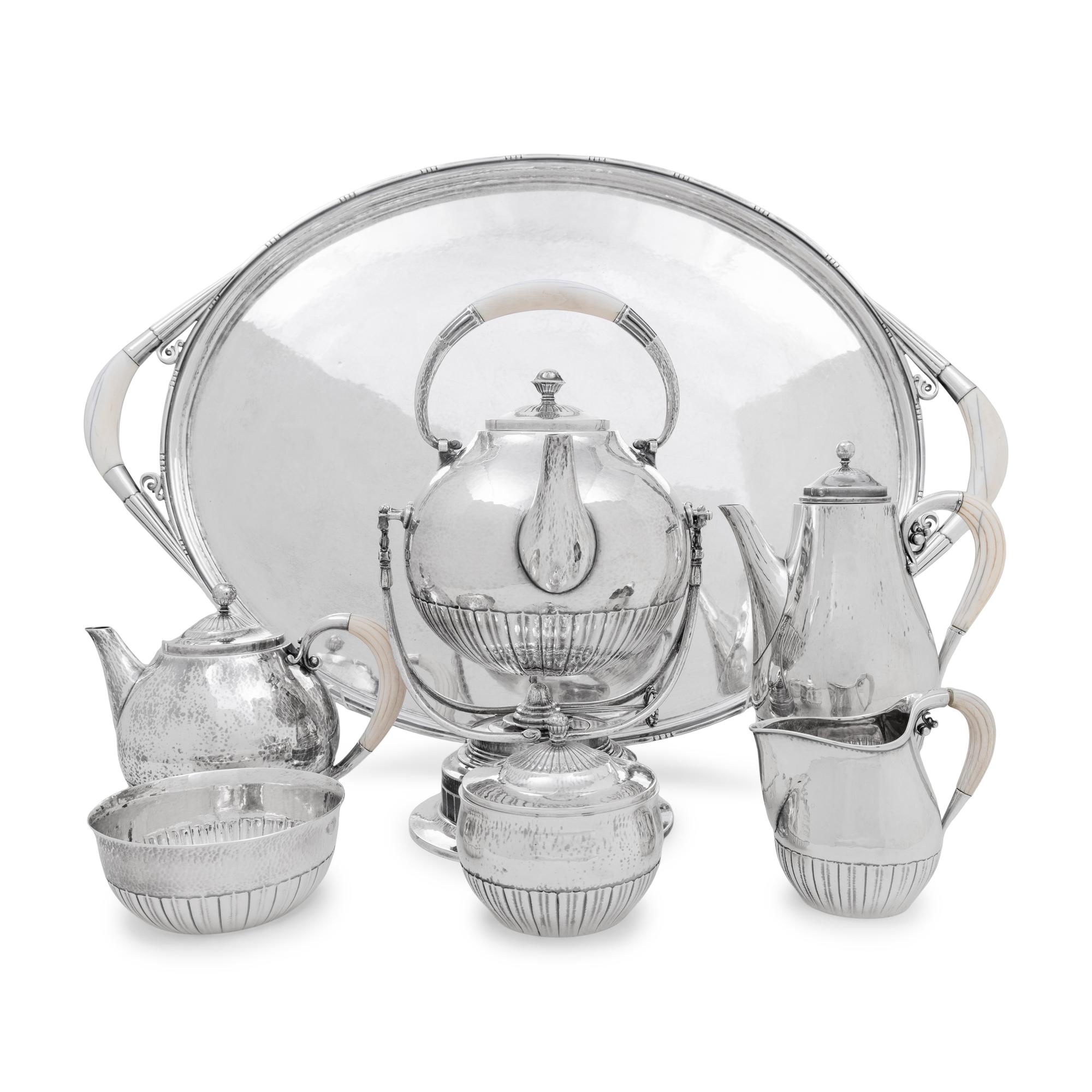 A Georg Jensen Cosmos Seven-Piece Silver Tea and Coffee Service