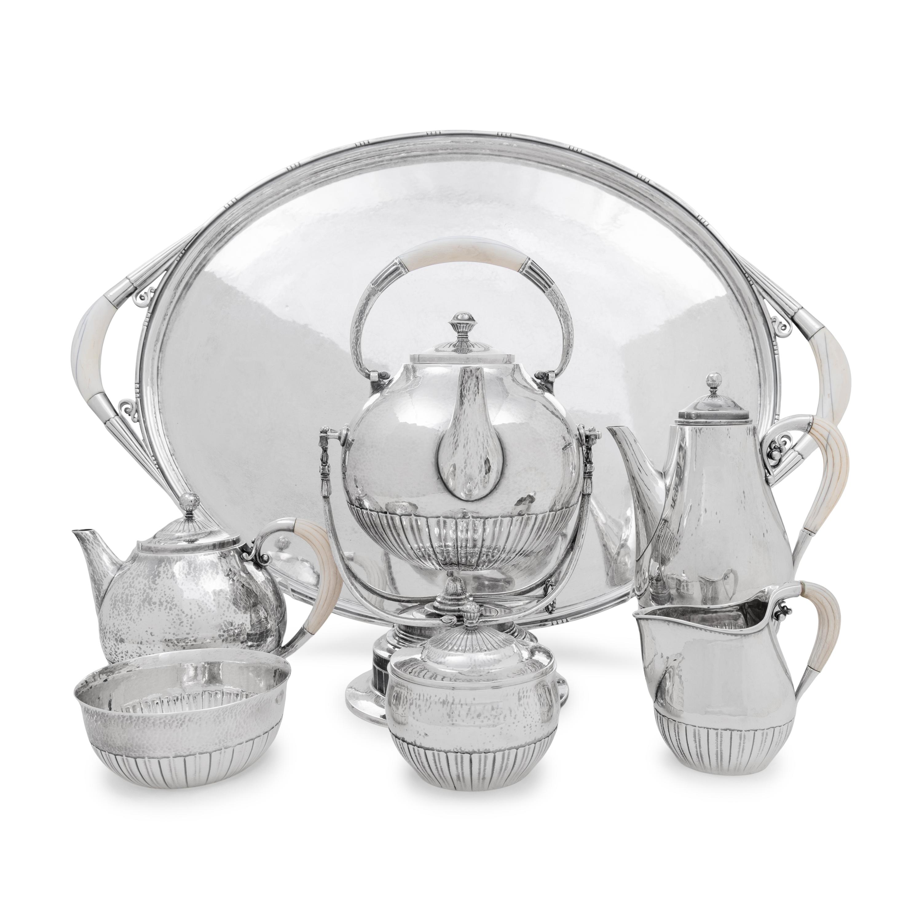 A Georg Jensen Cosmos Seven-Piece Silver Tea and Coffee Service