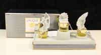 A Group of Three Lalique Frosted Glass Perfume Bottles. Height of tallest 5 1/2 inches.