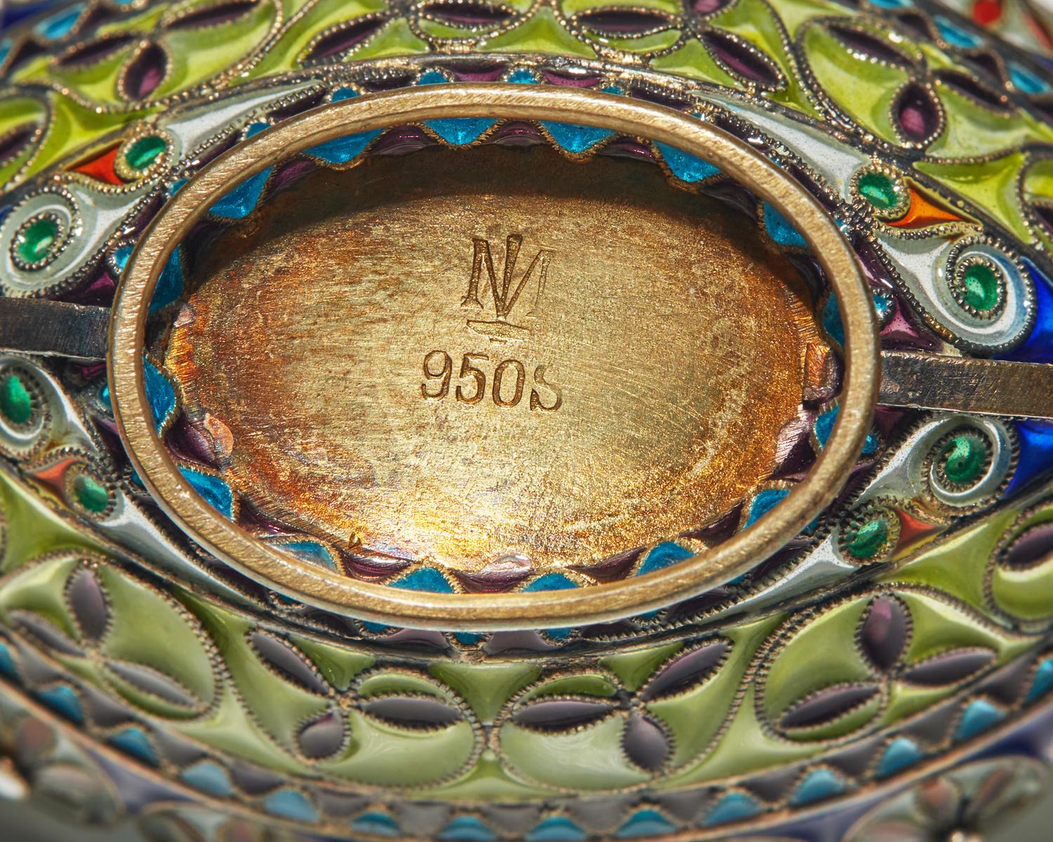 A collection of fifteen Russian, German, and Norwegian shaded enamel and plique-à-jour and silver / silver gilt items, various makers, late 19th / early 20th century