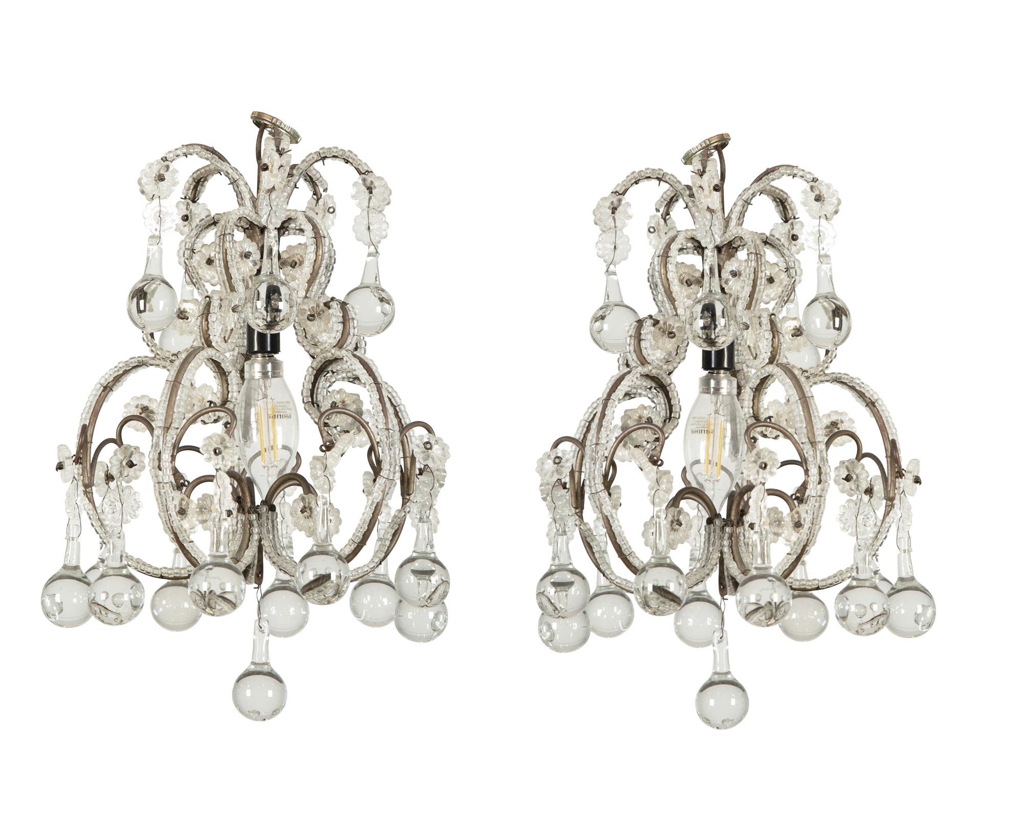 A Pair of Gilt Metal and Glass-Beaded Chandeliers