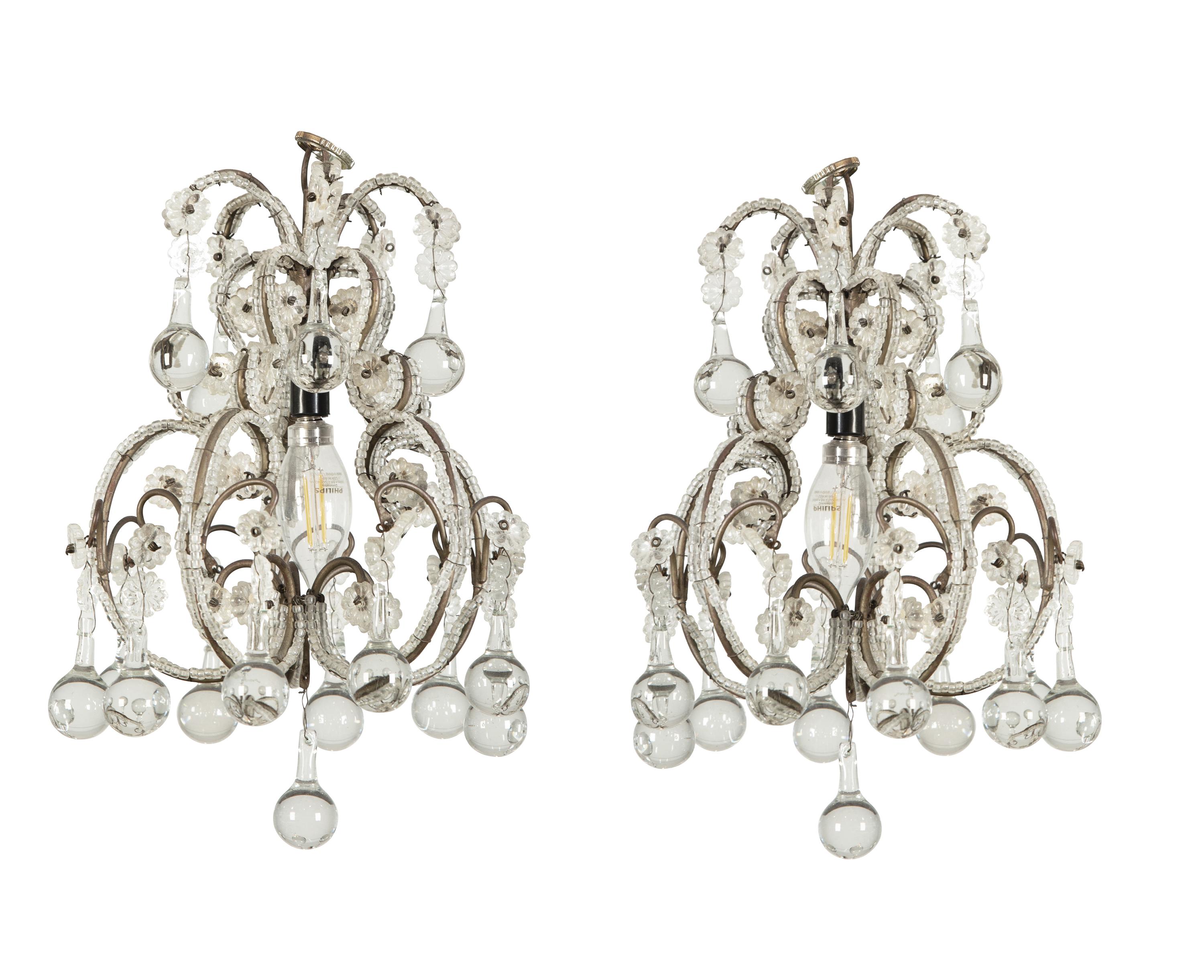 A Pair of Gilt Metal and Glass-Beaded Chandeliers