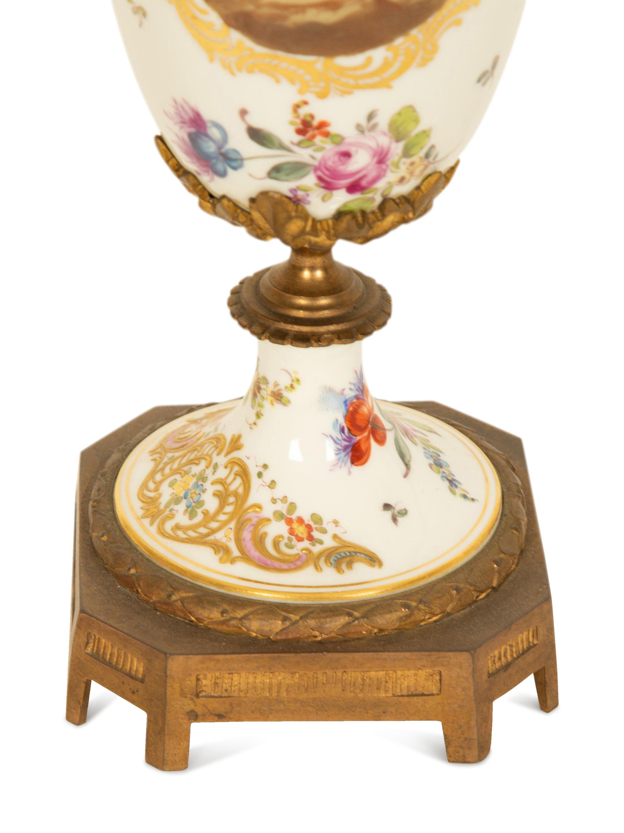 A Sevres Style Gilt Metal Mounted Porcelain Urn