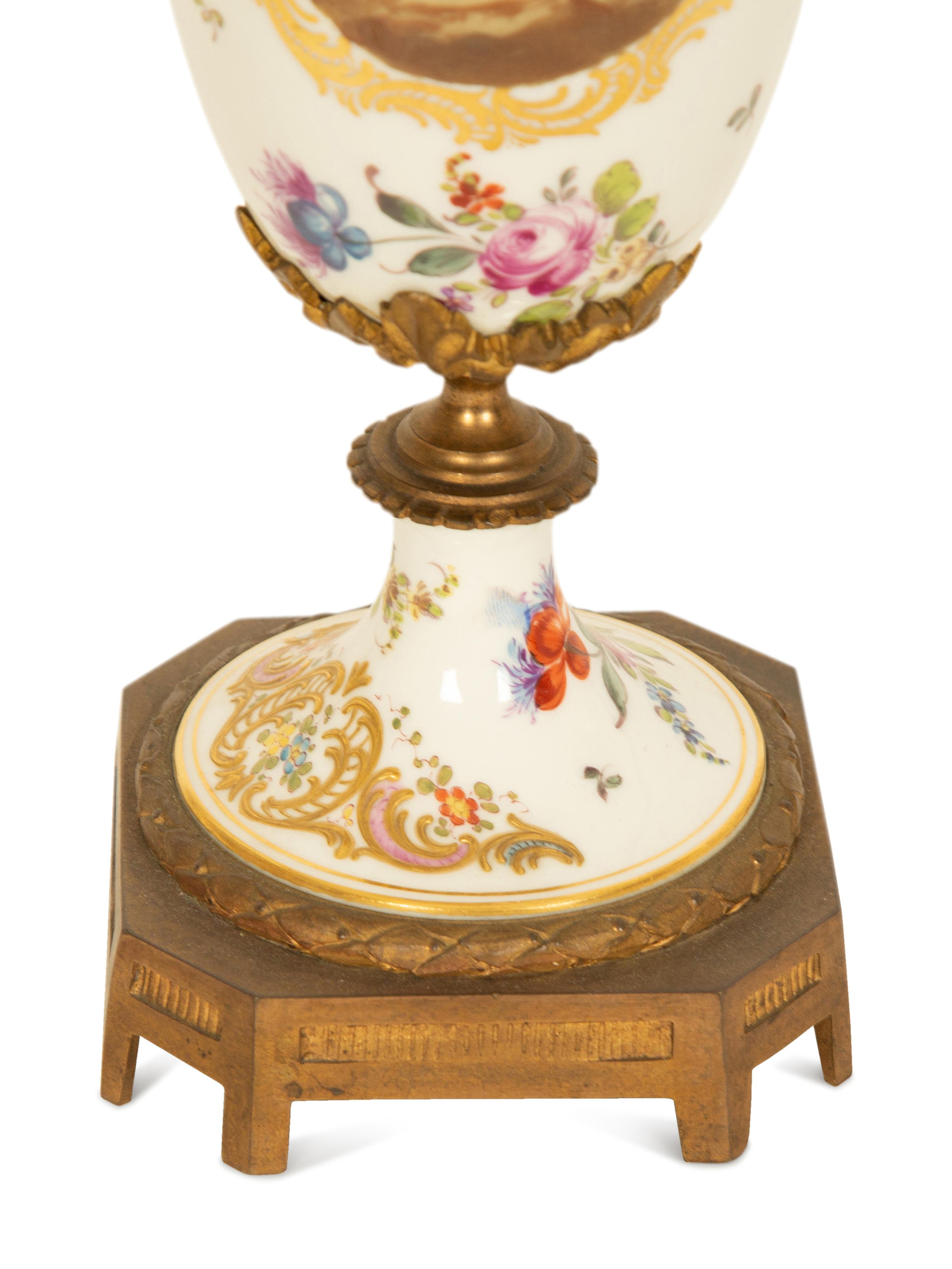 A Sevres Style Gilt Metal Mounted Porcelain Urn