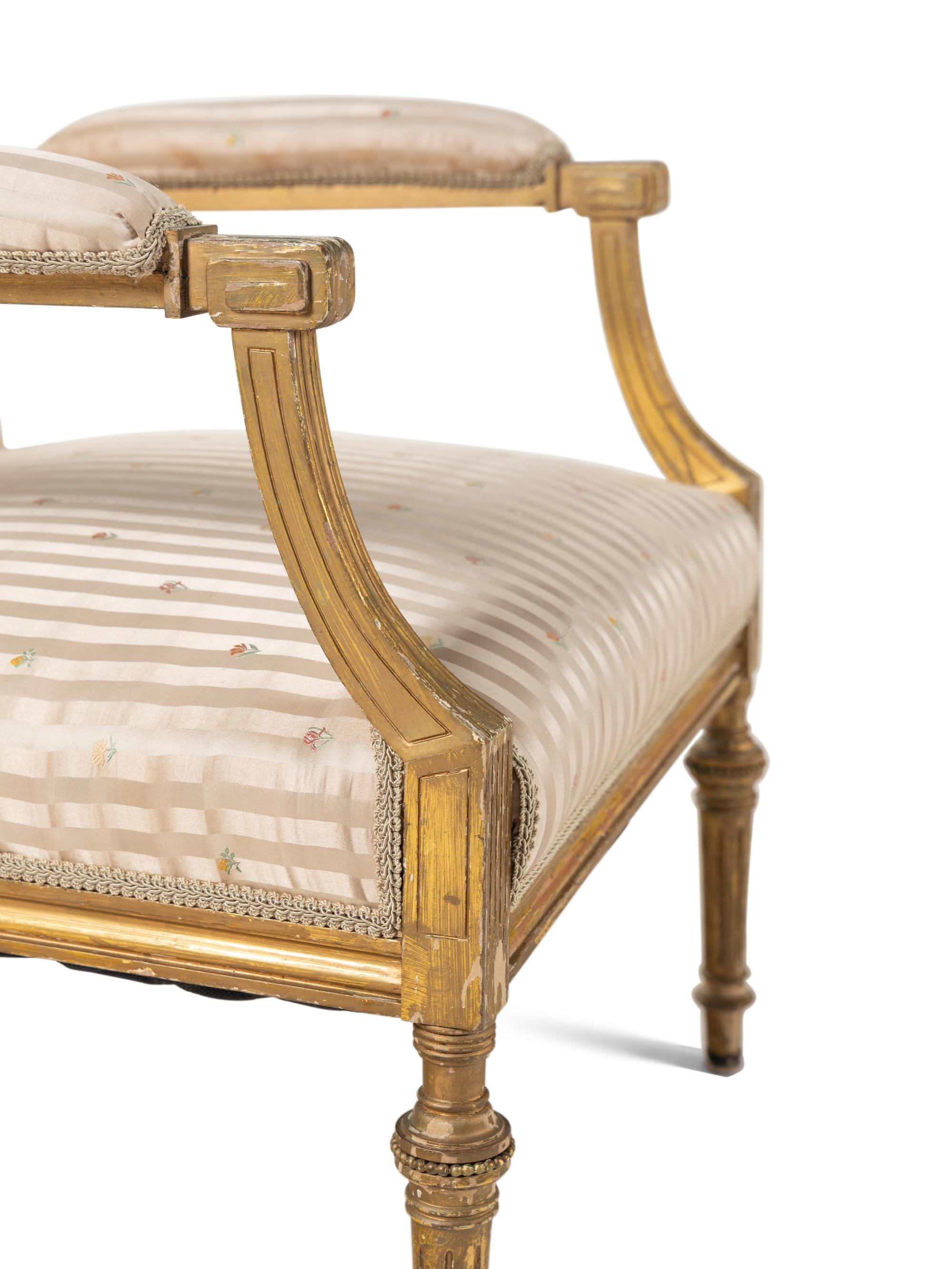 A Louis XVI Style Giltwood Armchair