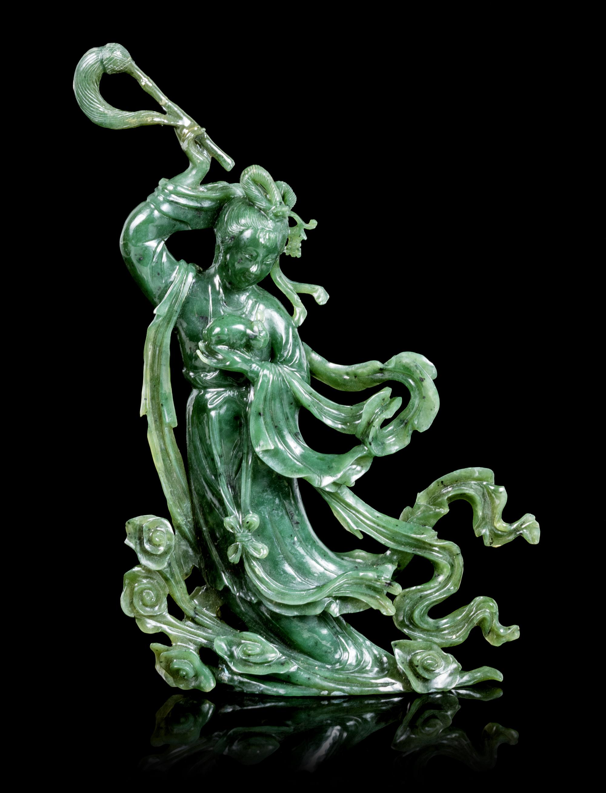 A Pair of Spinach Jade Figures of Birds Height of each 7 3/4 inches. — 20TH CENTURY