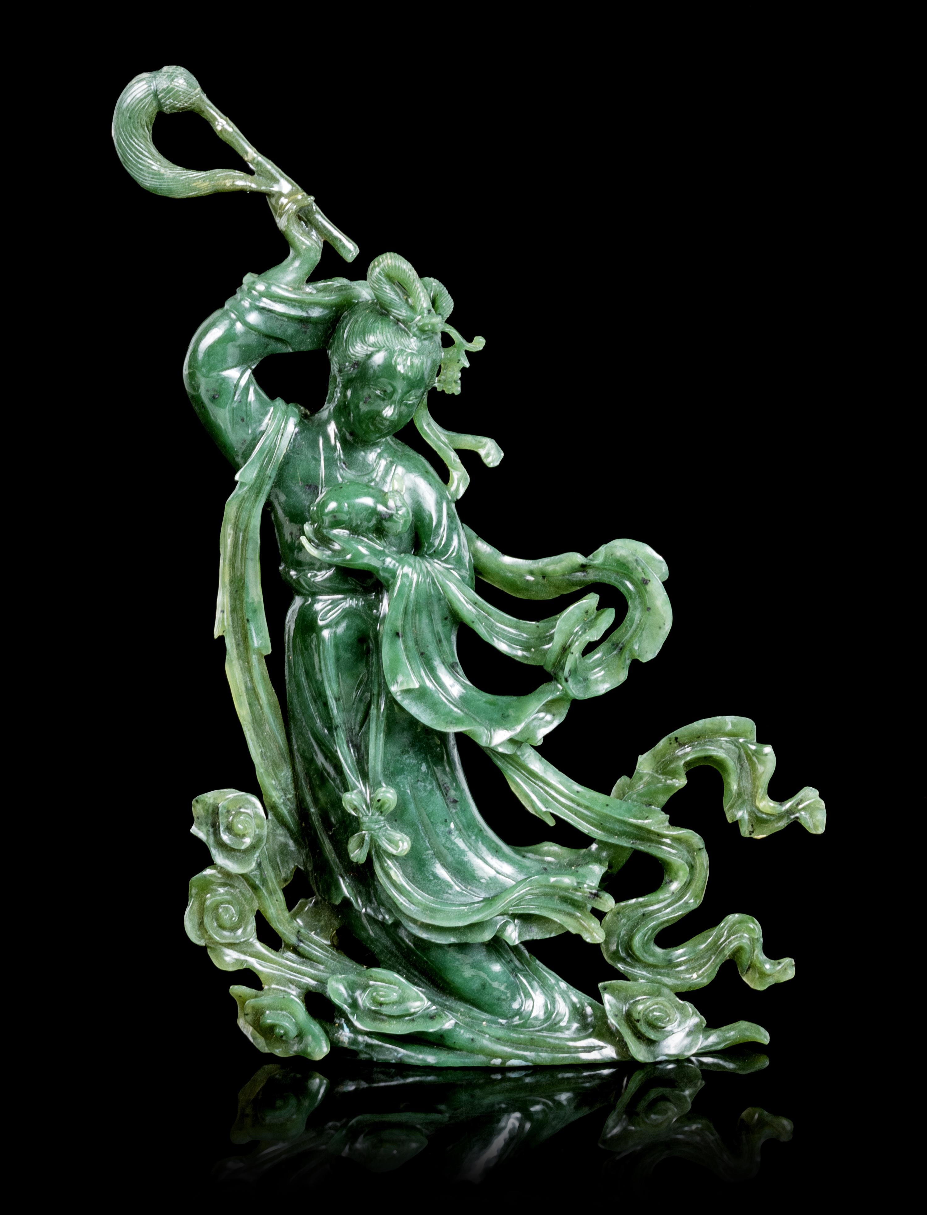 A Pair of Spinach Jade Figures of Birds Height of each 7 3/4 inches. — 20TH CENTURY