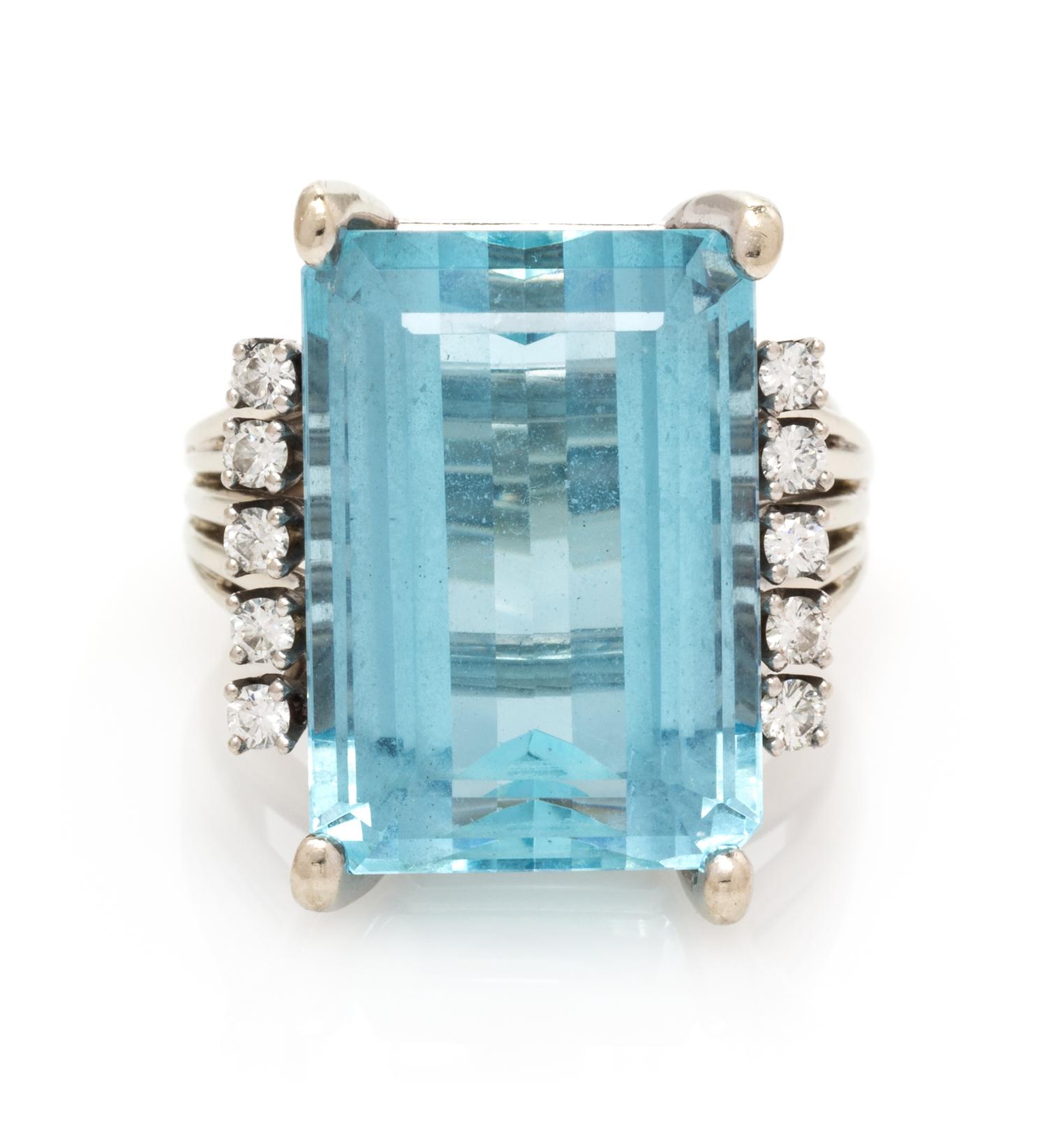 A 14 Karat White Gold, Aquamarine and Diamond Ring, 8.00 dwts.