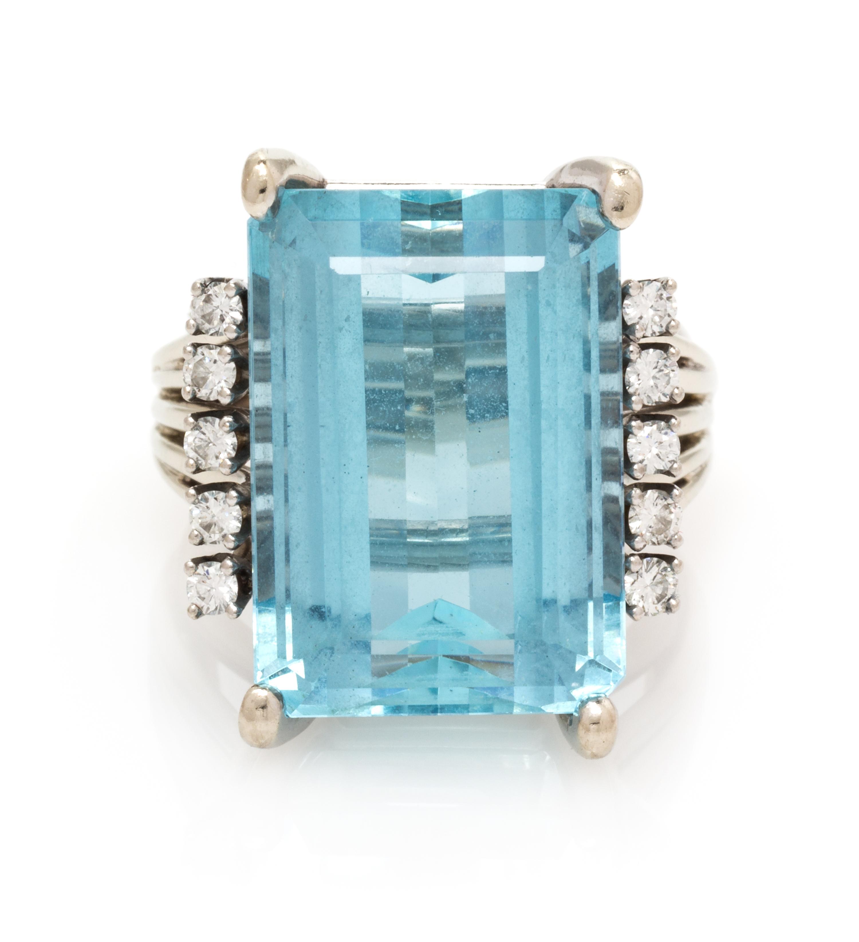 A 14 Karat White Gold, Aquamarine and Diamond Ring, 8.00 dwts.