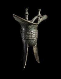 A Chinese Archaistic Bronze Jue Drinking Vessel