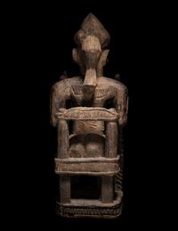 A Baule Wood Seated Male Figure
