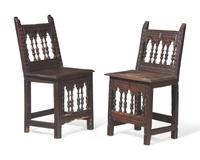 A Pair of Spanish Baroque Carved Walnut Side Chairs, 17th Century