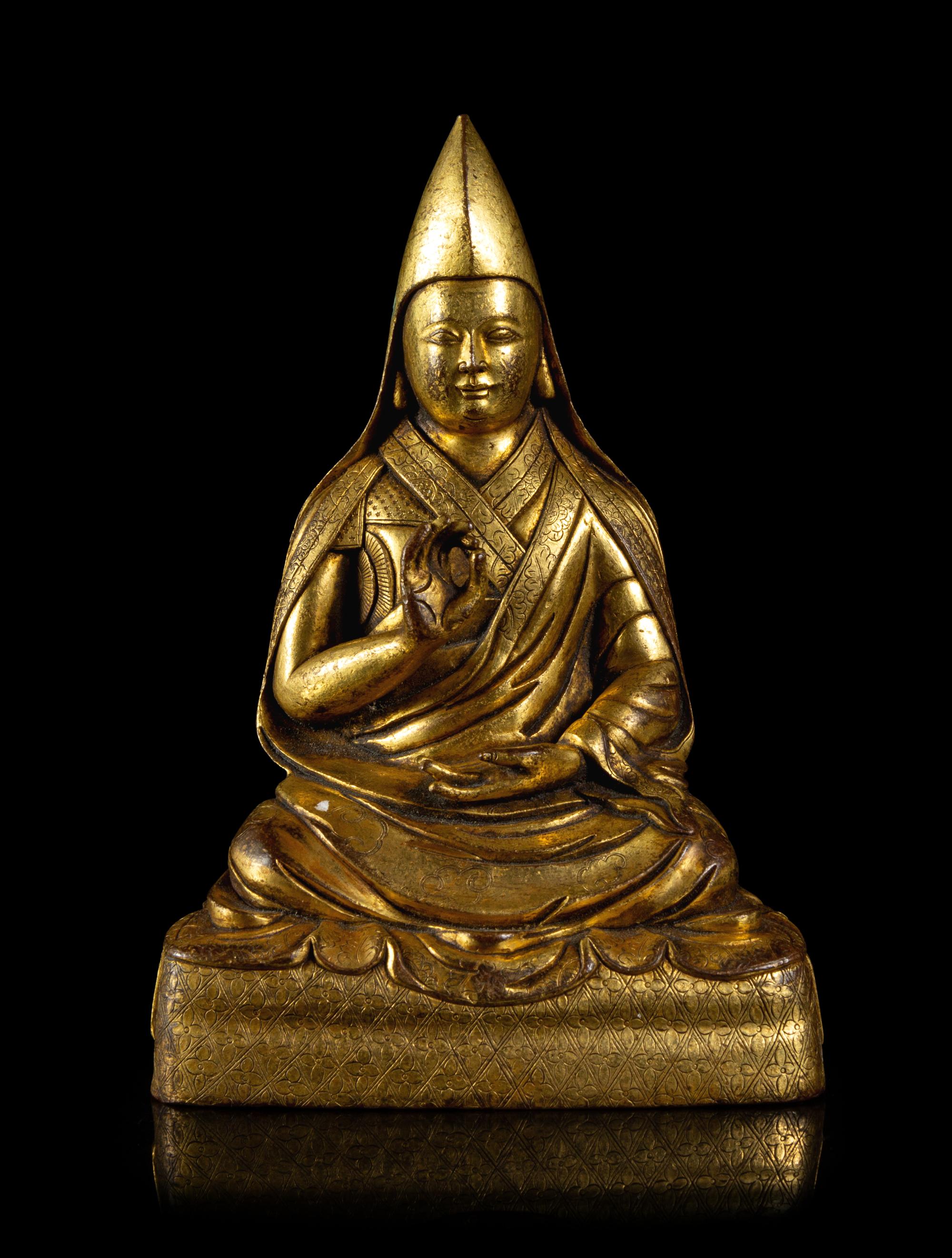 A Sino-Tibetan Gilt Bronze Figure of Gelukpa Lama