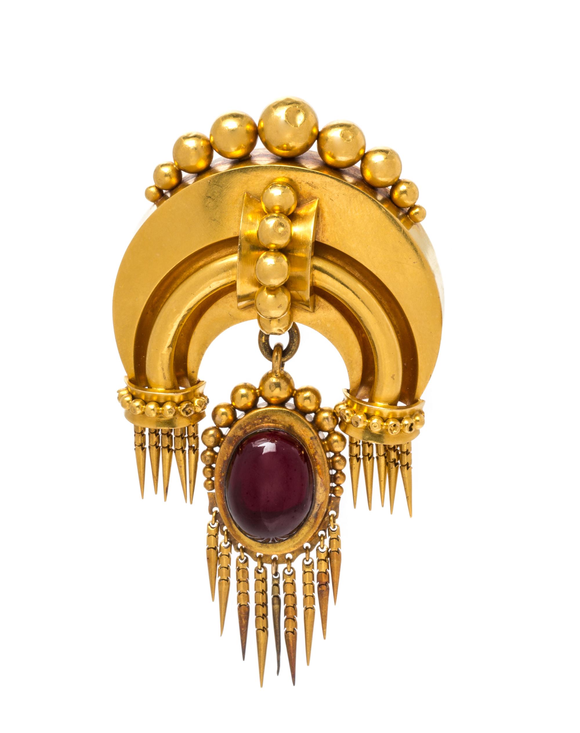 An Etruscan Revival Yellow Gold and Garnet Brooch, 12.40 dwts.