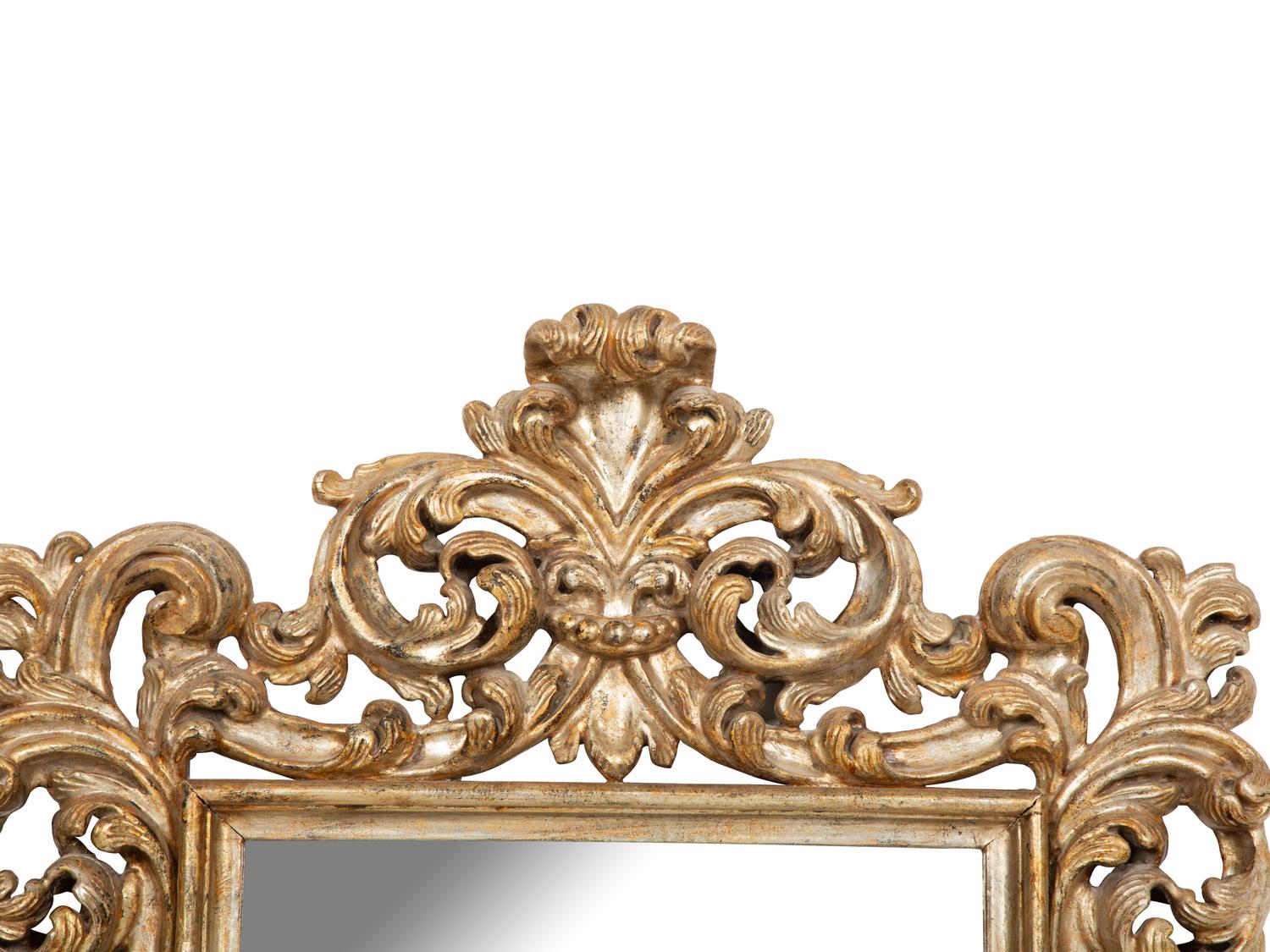 An Italian Rococo Style Silvered Wood Mirror