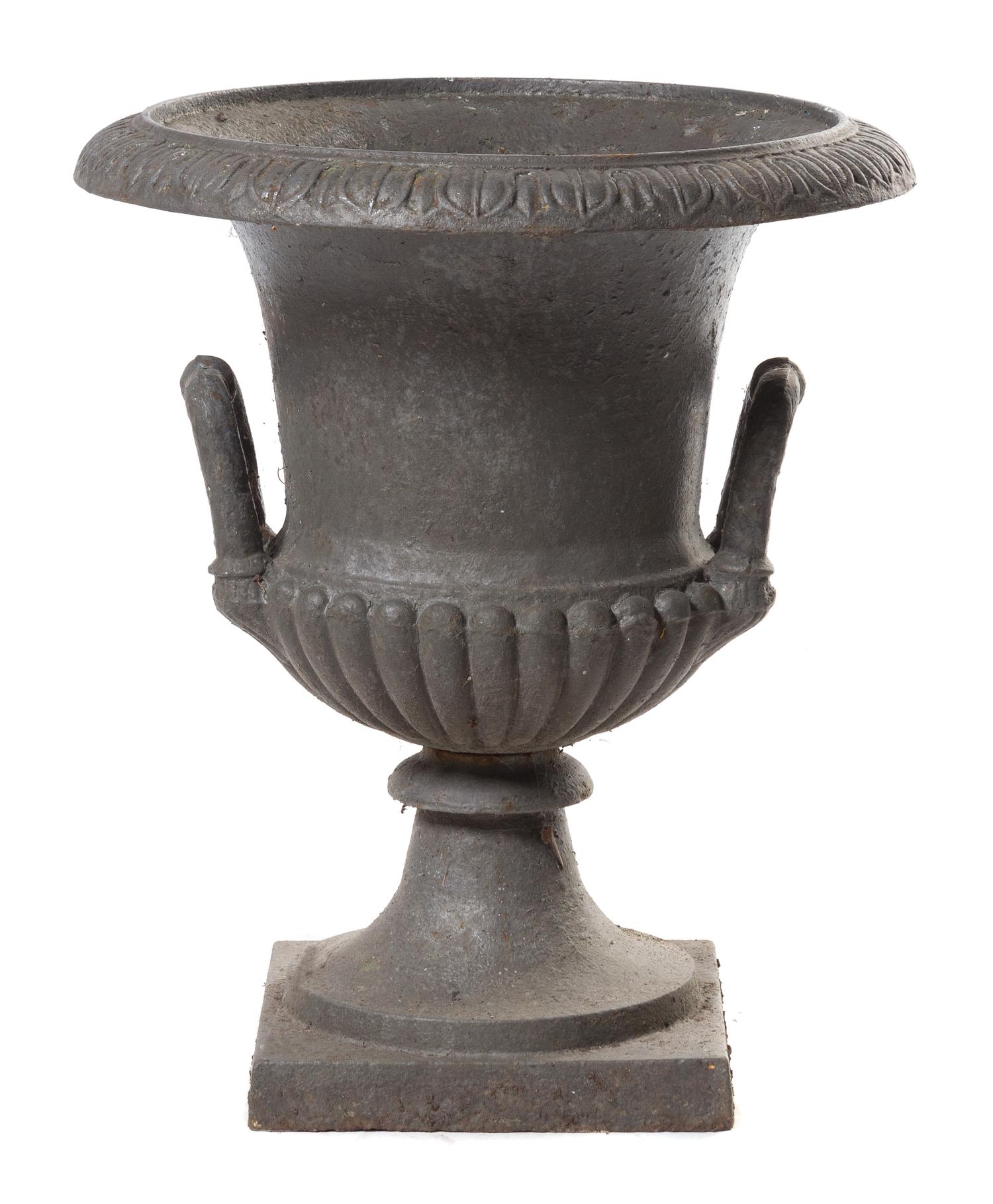 A Victorian Cast Iron Garden Urn Height 24 inches.