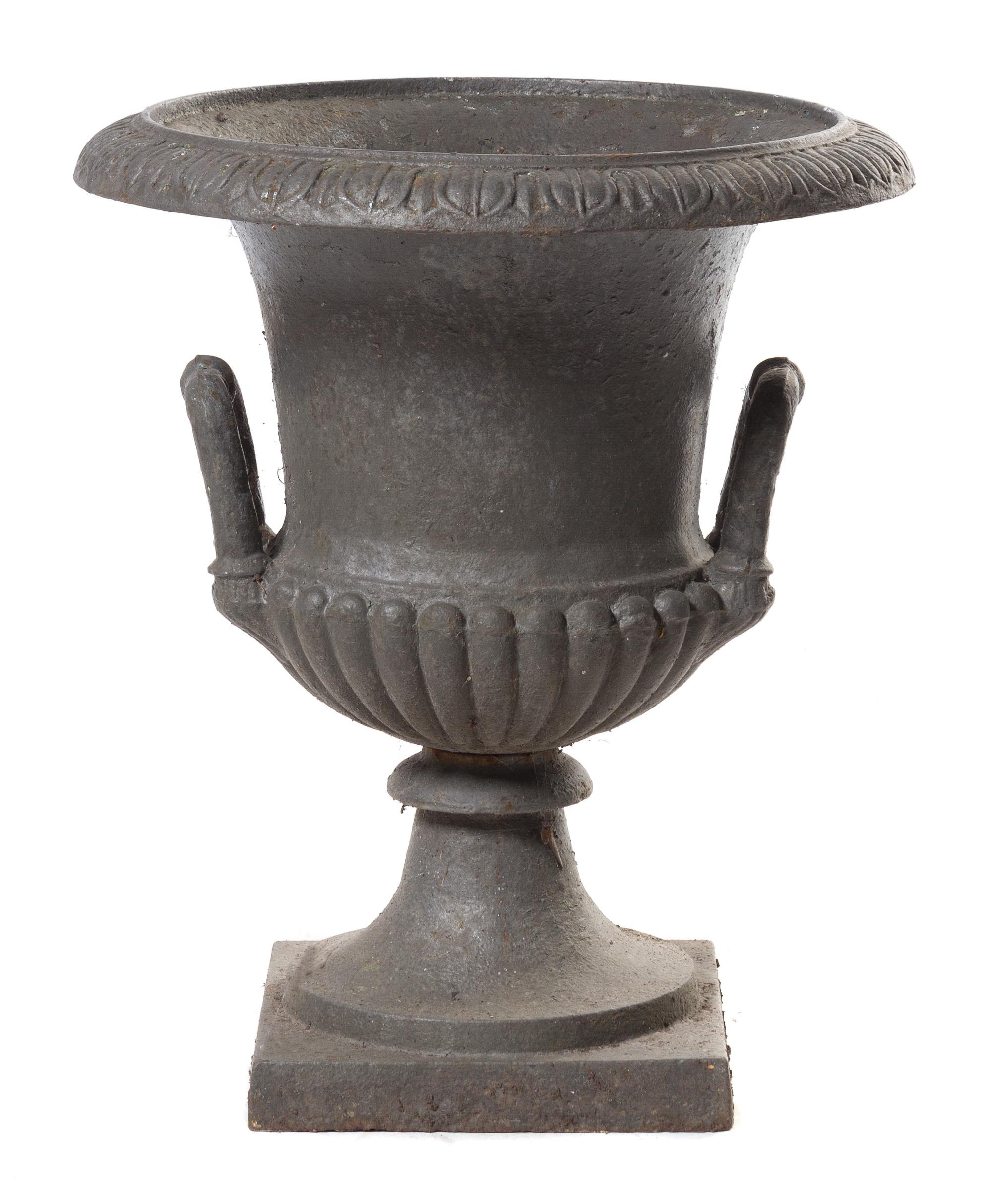 A Victorian Cast Iron Garden Urn Height 24 inches.