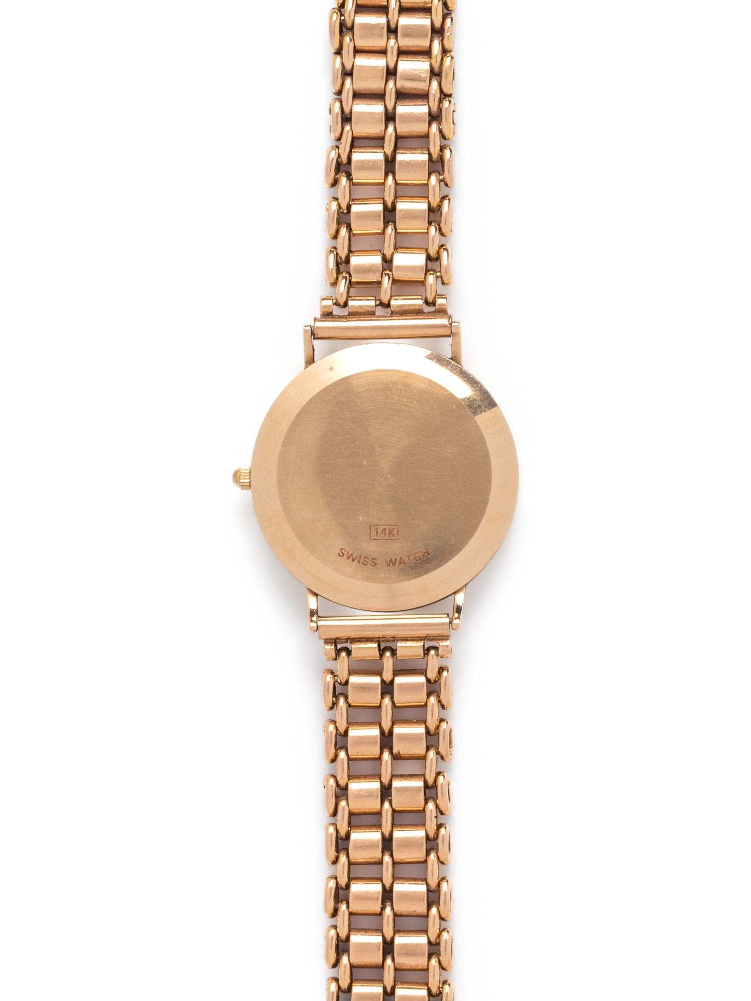 YELLOW GOLD WRISTWATCH