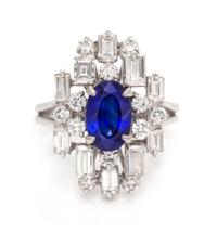 An 18 Karat White Gold, Sapphire and Diamond Ring, 5.20 dwts.