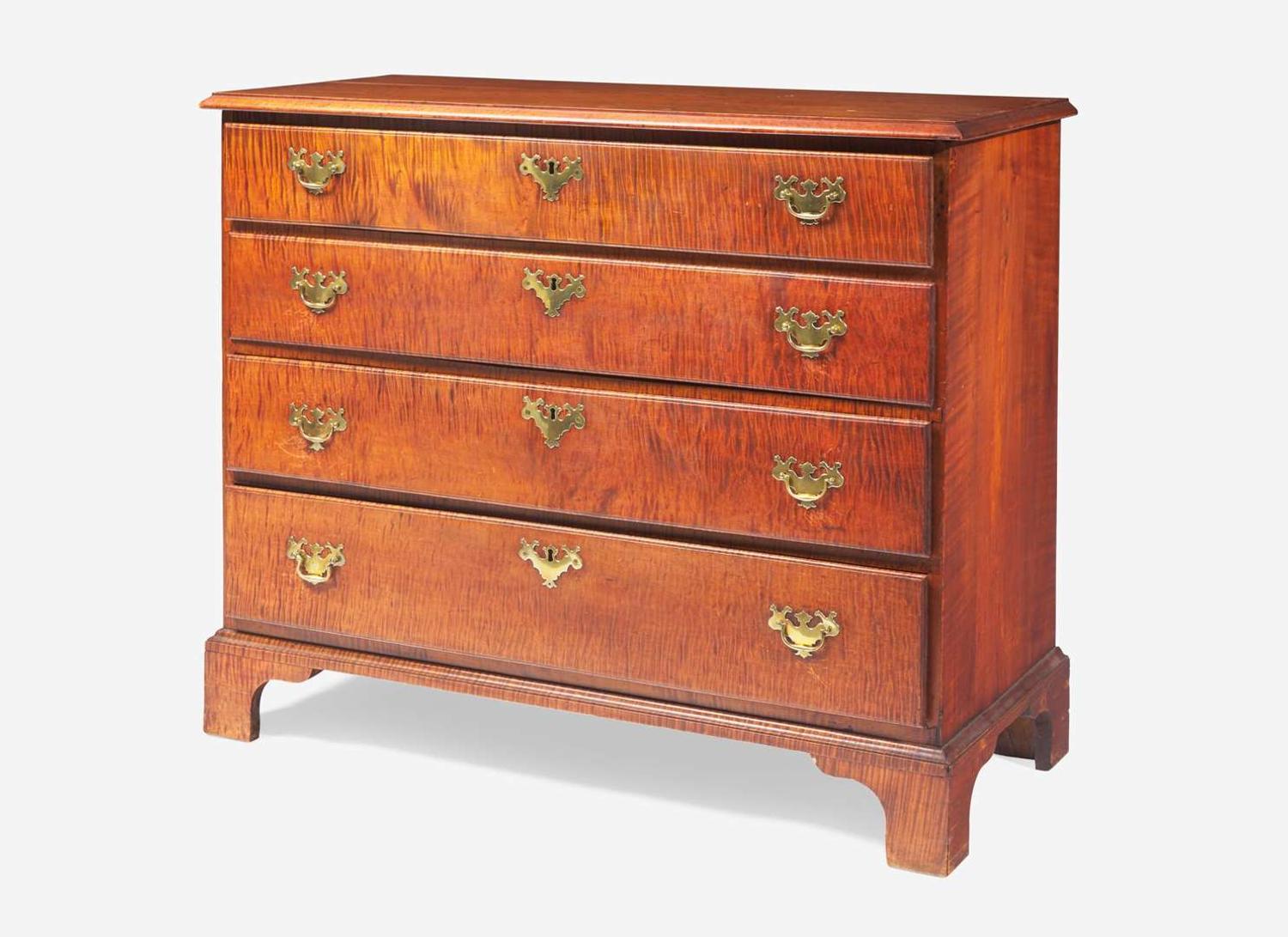A Chippendale figured maple chest of drawers, New England, late 18th century
