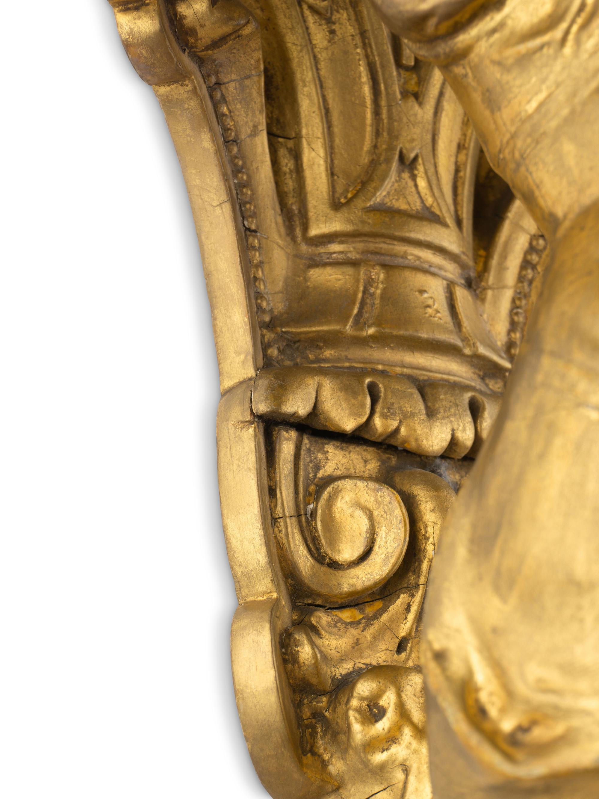 An Italian Carved Giltwood Figural Corner Wall Bracket