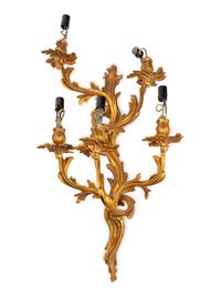 A Set of Four Louis XV Style Gilt Metal Five-Light Sconces