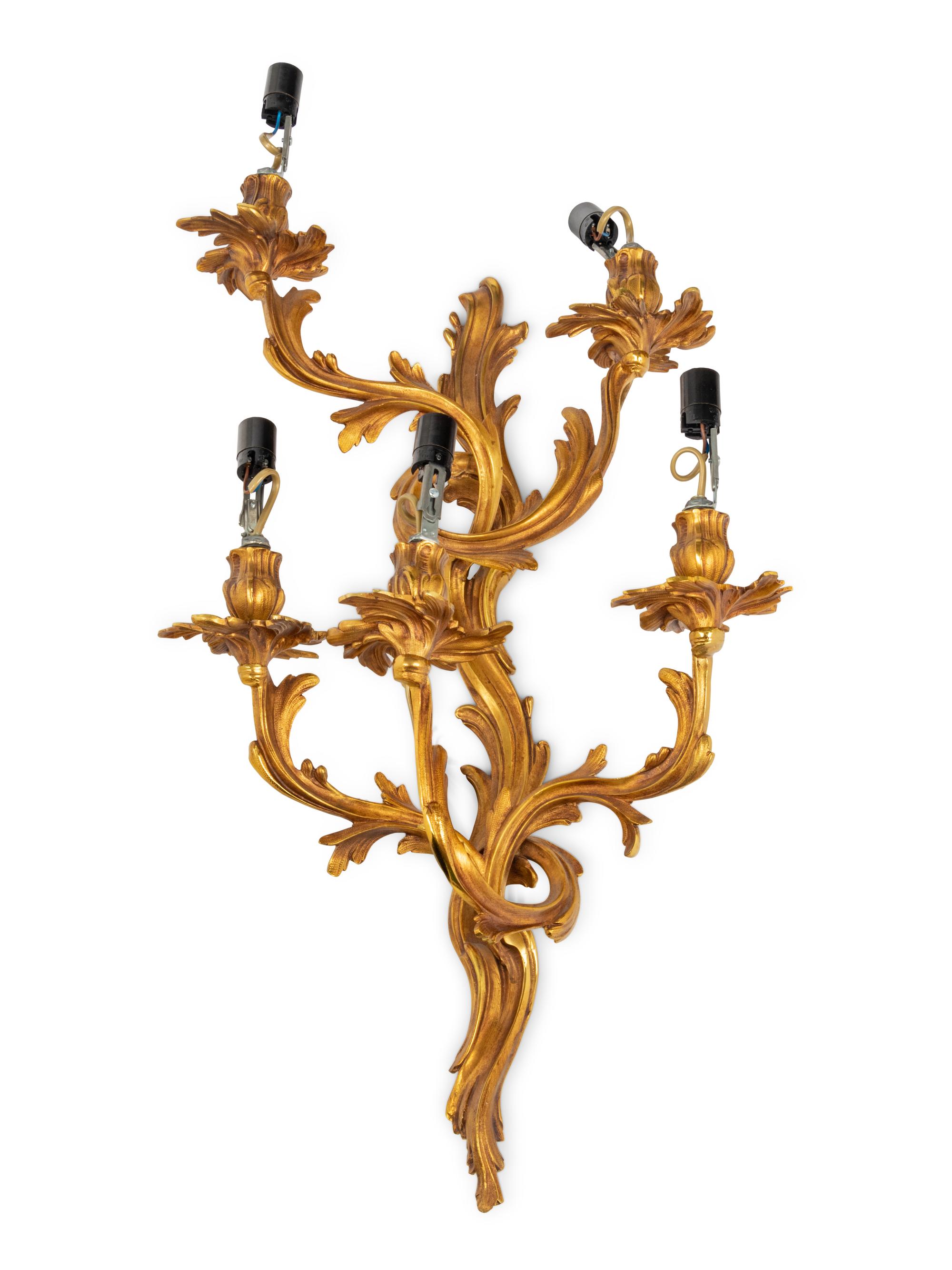 A Set of Four Louis XV Style Gilt Metal Five-Light Sconces