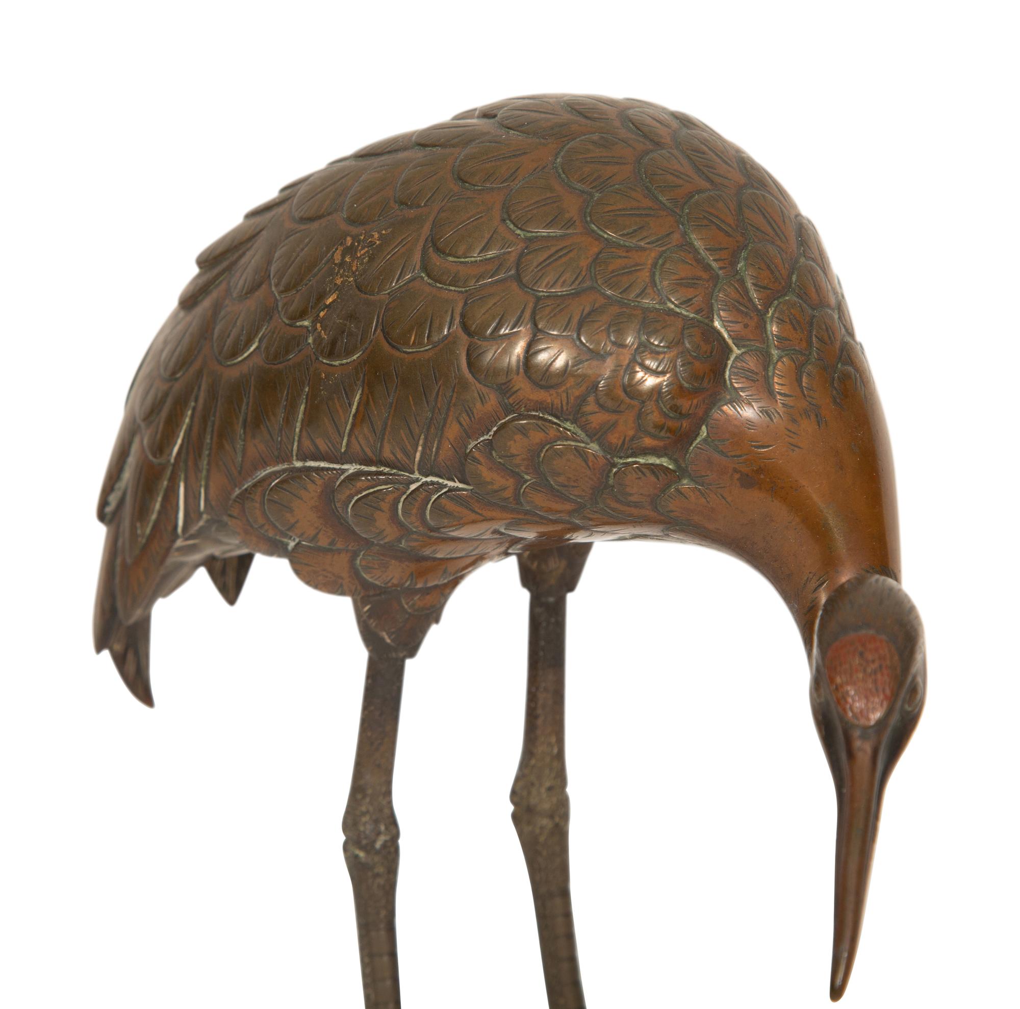 A Pair of Japanese Bronze Figures of Cranes