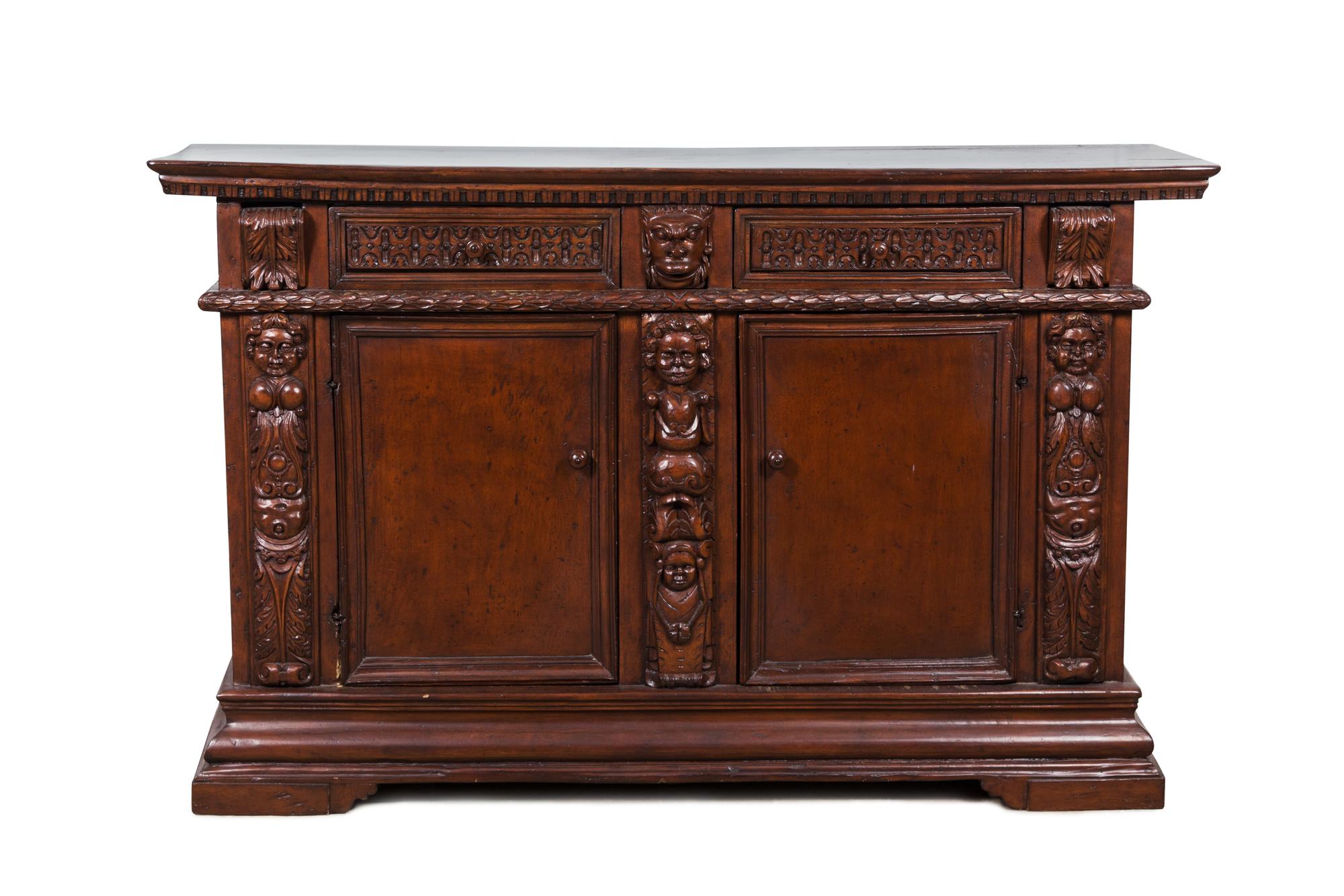 A Jacobean Style Walnut Server Height 44 x width 70 3/4 x depth 20 3/4 inches.
