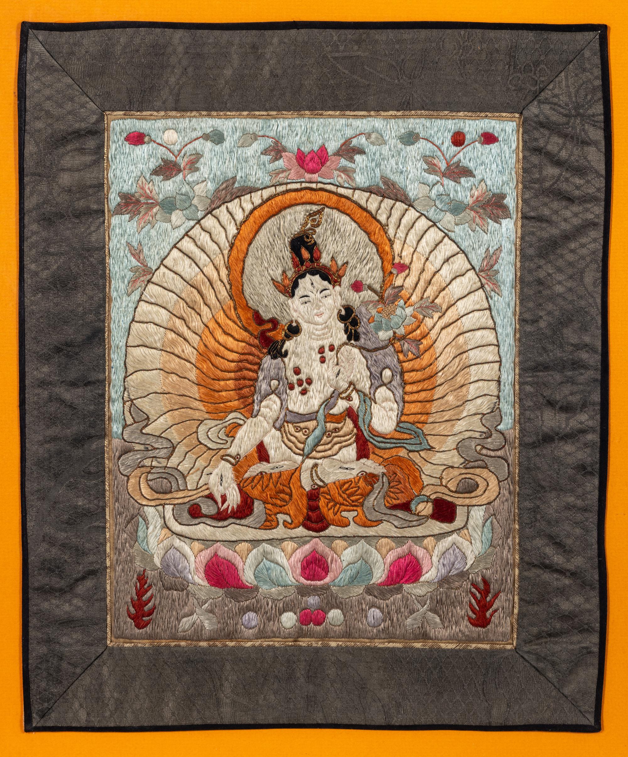 A Chinese Embroidered Silk Thangka