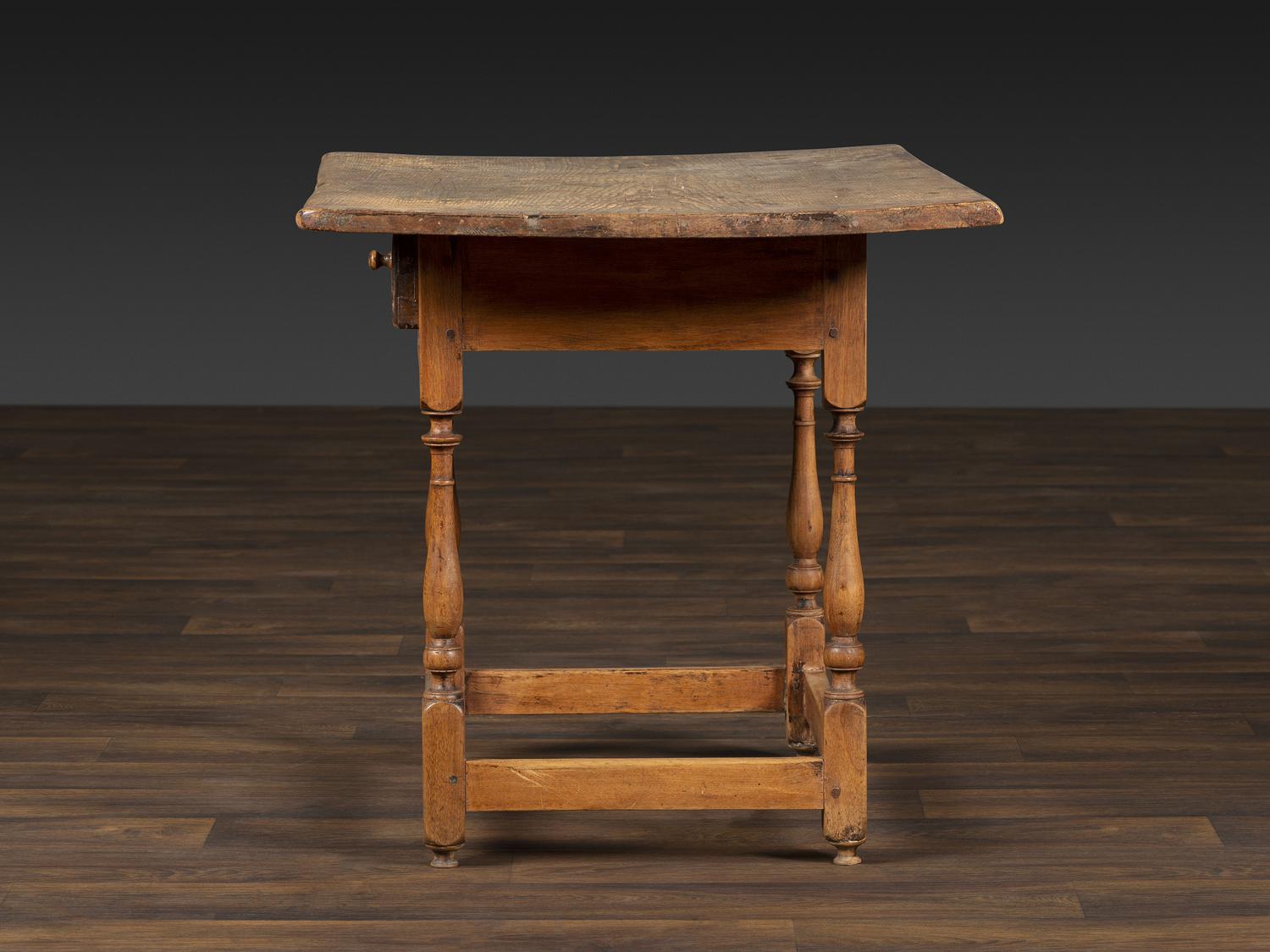 A William and Mary Pine and Maple Scrubbed Top Tavern Table