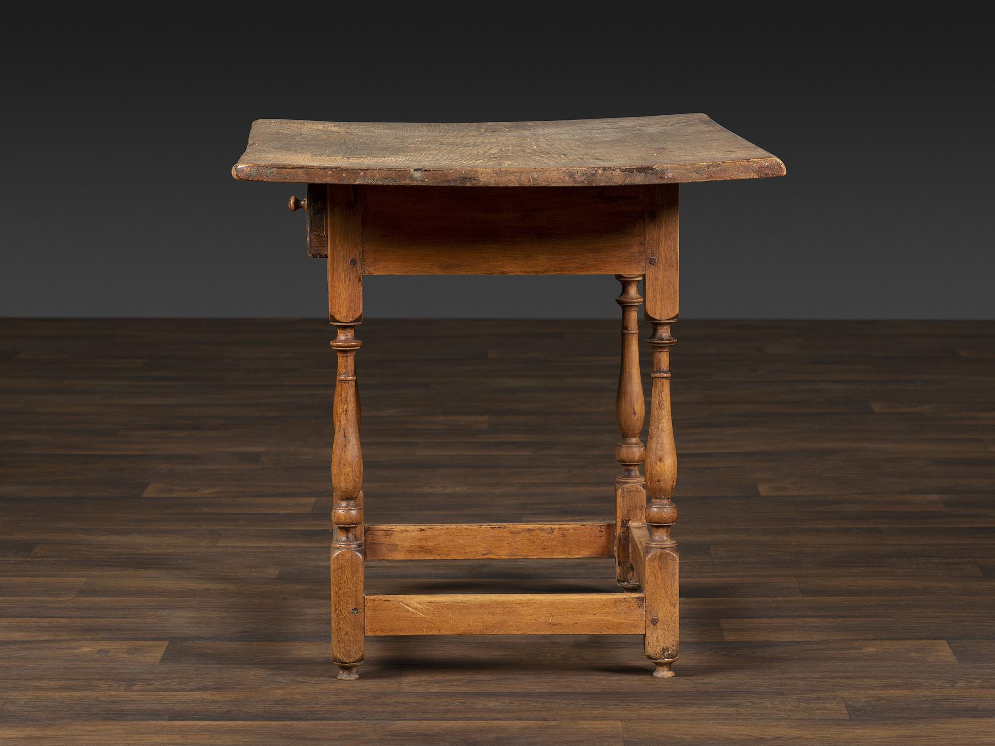 A William and Mary Pine and Maple Scrubbed Top Tavern Table