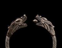 A Pair of Chinese Silver 'Dragon' Bangles