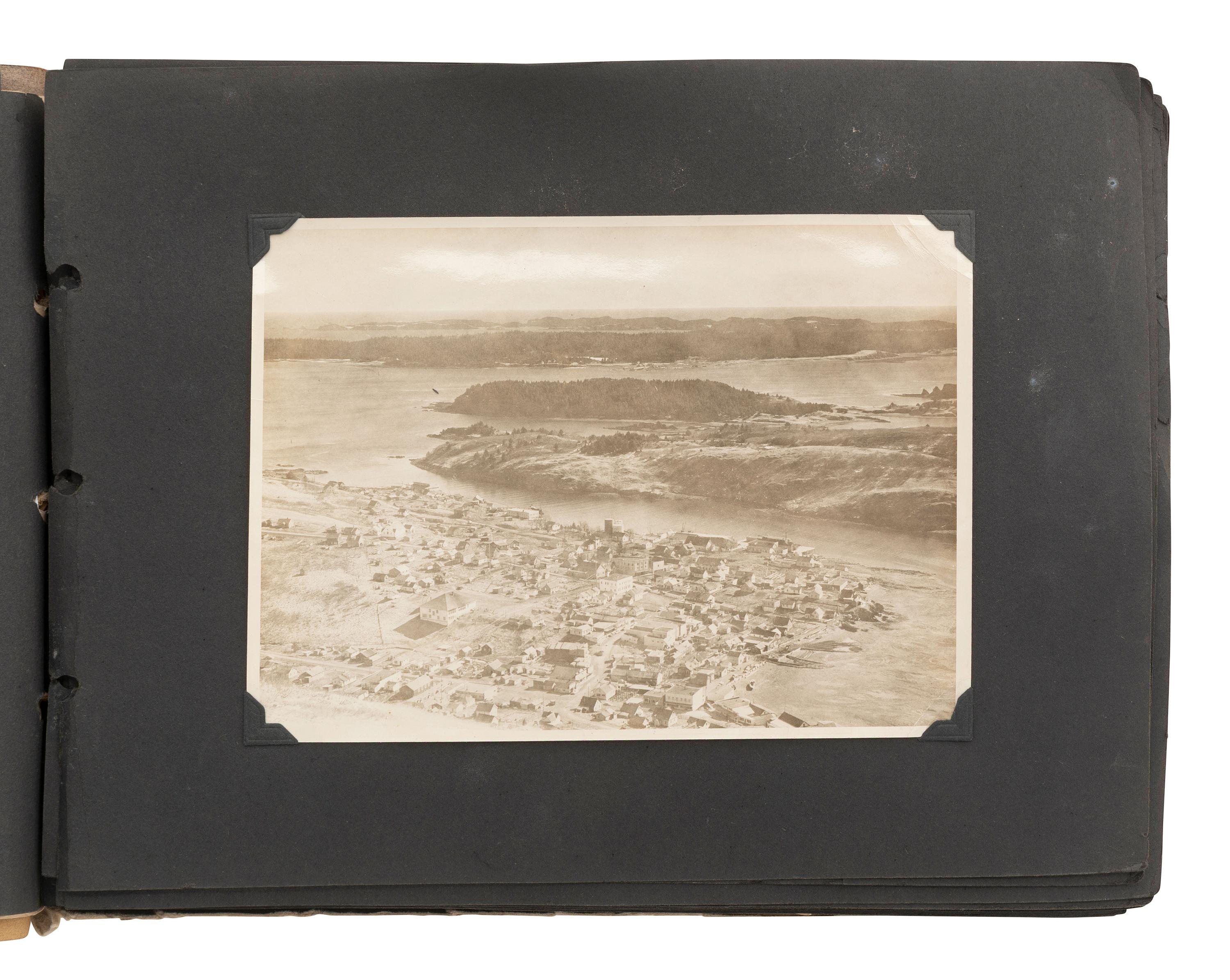 [WESTERN AMERICANA]. Souvenir album feat. photographs of Kodiak, Alaska, incl. military subjects.