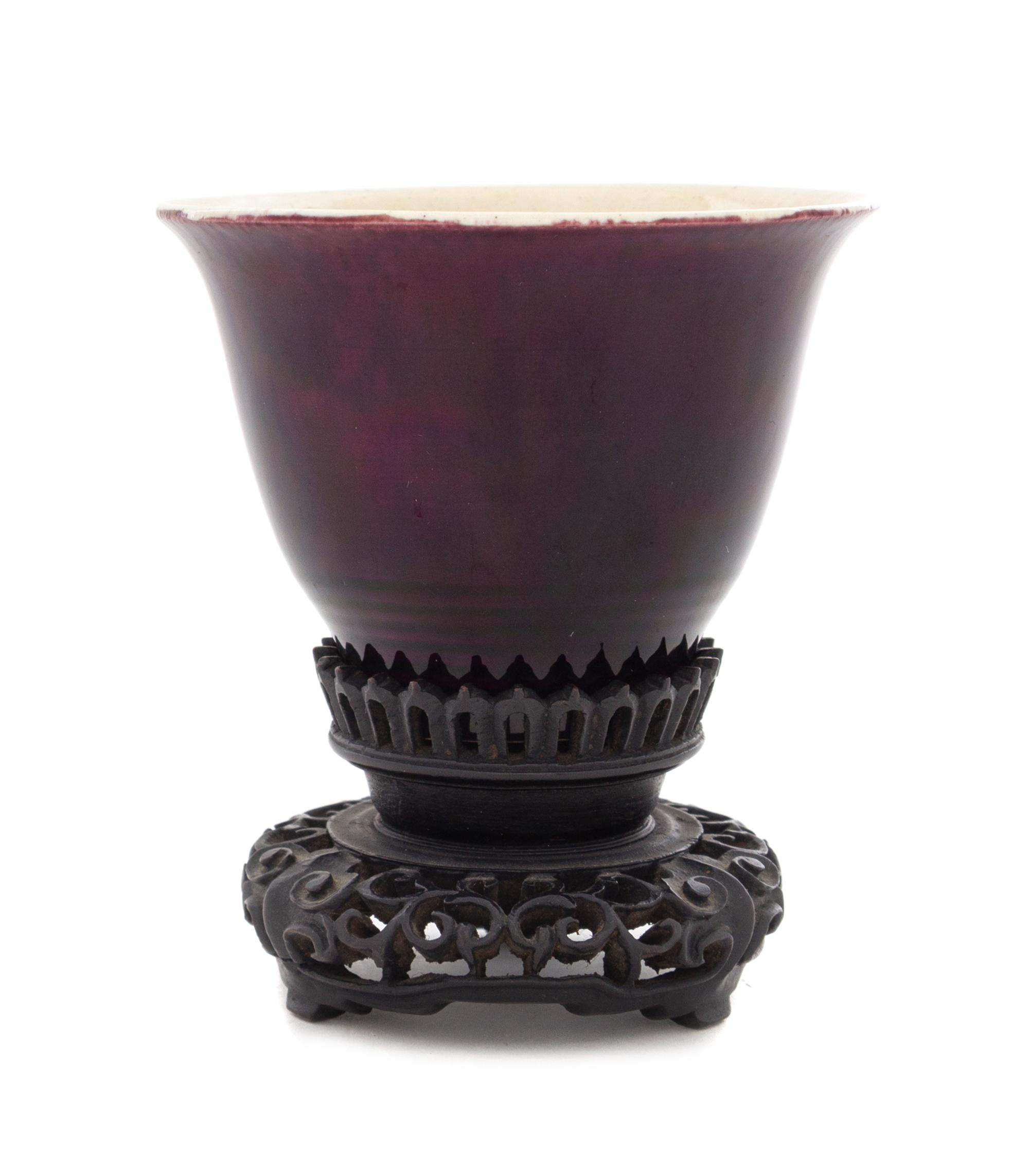 A Chinese Aubergine Glazed Porcelain Cup Height 2 1/2 inches. — 19TH CENTURY