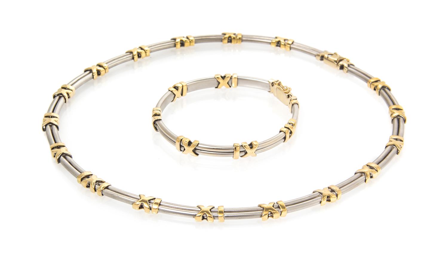 An 18 Karat White and Yellow Gold Demi Parure, 46.80 dwts.